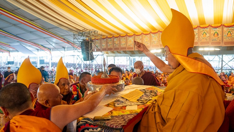 Ganden Tri Rinpoché presenting ritual offerings during the Long Life Prayer offered to His Holiness the Dalai Lama at the Kalachakra Ground in Bodhgaya, Bihar, India on January 1, 2024. Photo by Tenzin Choejor Ganden Tri Rinpoché presenting ritual offerings during the Long Life Prayer offered to His Holiness the Dalai Lama at the Kalachakra Ground in Bodhgaya, Bihar, India on January 1, 2024. Photo by Tenzin Choejor