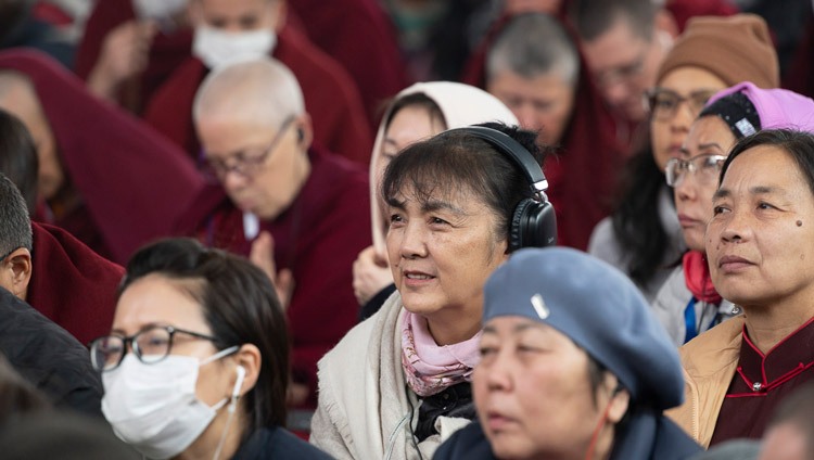 Members of the crowd, some listening to translations, watching the proceedings during the Long Life Prayer offered to His Holiness the Dalai Lama at the Kalachakra Ground in Bodhgaya, Bihar, India on January 1, 2024. Photo by Ven Zamling Norbu Members of the crowd, some listening to translations, watching the proceedings during the Long Life Prayer offered to His Holiness the Dalai Lama at the Kalachakra Ground in Bodhgaya, Bihar, India on January 1, 2024. Photo by Ven Zamling Norbu