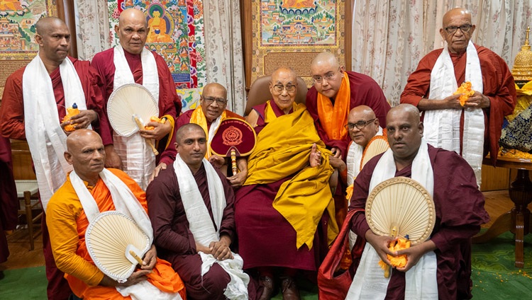 Members of the delegation that offered a relic of the Buddha pose with for a photo with His Holiness the Dalai Lama at his residence in Dharamsala, HP, India on April 4, 2024. Photo by Tenzin Choejor Members of the delegation that offered a relic of the Buddha pose with for a photo with His Holiness the Dalai Lama at his residence in Dharamsala, HP, India on April 4, 2024. Photo by Tenzin Choejor