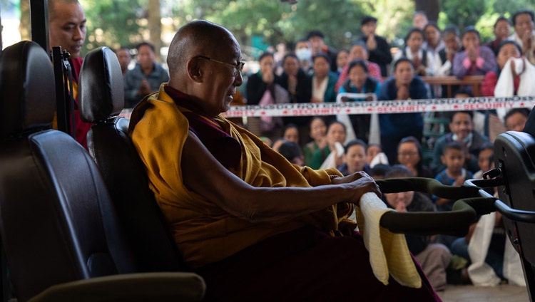 His Holiness the Dalai Lama riding in a golf cart on his way to the Main Tibetan Temple to join the Mani Dhungdrub in Dharamsala, HP, India on May 11, 2024. Photo by Tenzin Choejor