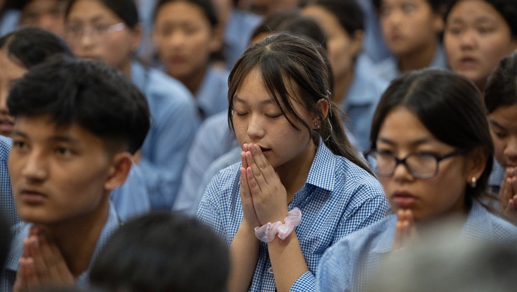 Students in the audience repeating verses recited by His Holiness the Dalai Lama during the generation of bodhichitta on the second day of teachings for young Tibetans at the Main Tibetan Temple in Dharamsala, HP, India on June 4, 2024. Photo by Tenzin Choejor Students in the audience repeating verses recited by His Holiness the Dalai Lama during the generation of bodhichitta on the second day of teachings for young Tibetans at the Main Tibetan Temple in Dharamsala, HP, India on June 4, 2024. Photo by Tenzin Choejor