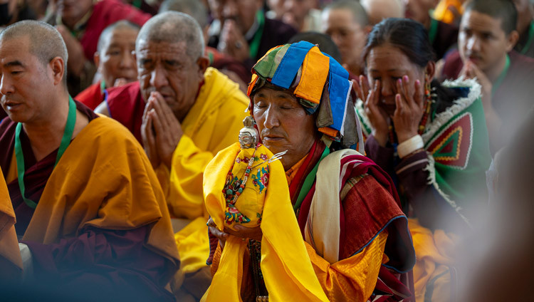 Members of the audience listening to His Holiness the Dalai Lama during the Long Life Prayers offered to him by the people of Spiti at the Main Tibetan Temple courtyard in Dharamsala, HP, India on April 10, 2025. Photo by Tenzin Choejor