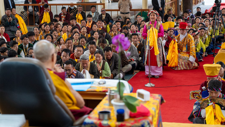 His Holiness the Dalai Lama looking on as an artist from one of the opera troupes participating in the Shoton Fetival performs a short song during their audience at the Main Tibetan Temple in Dharamsala, HP, India on May 10, 2025. Photo by Tenzin Choejor
