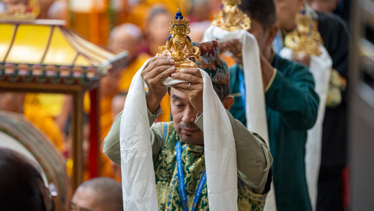 A procession from among the groups of patrons holding offerings during the Long Life Prayers for His Holiness the Dalai Lama at the Main Tibetan Temple in Dharamsala, HP, India on June 4, 2025. Photo by Tenzin Choejor