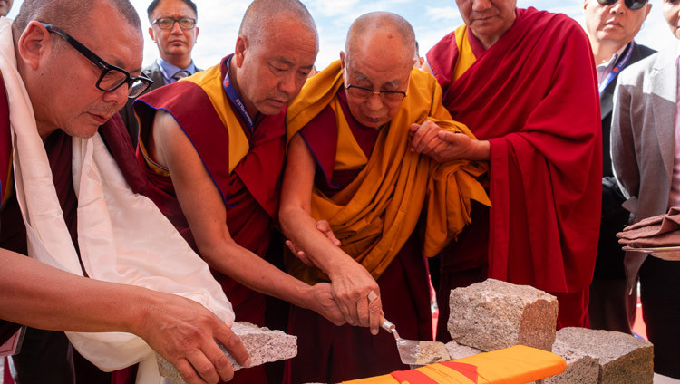 His Holiness the Dalai Lama laying the foundation stone of the Zanskar Mönlam Chörten at the Kalachakra Ground in Padam, Zanskar, Ladakh, India on July 23, 2025. Photo by Tenzin Choejor