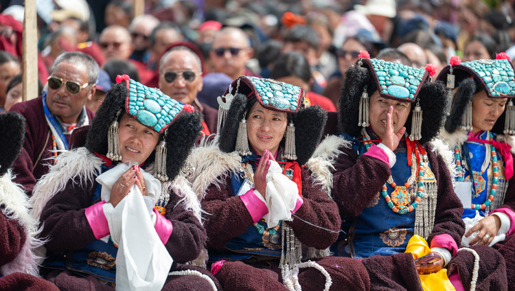 Members of the community wearing traditional dress listening to His Holiness the Dalai Lama during Long Life Prayers offered to him by the people of Ladakh at the Kalachakra Ground in Padum, Zanskar, Ladakh, India on July 23, 2025. Photo by Ven Zamling Norbu