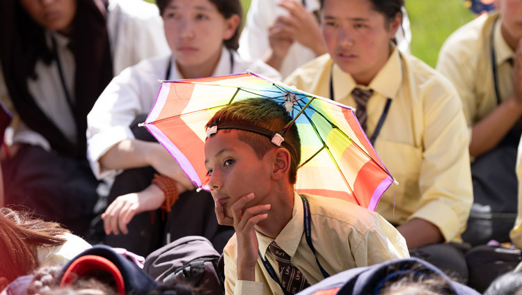 Young students in the crowd listening to His Holiness the Dalai Lama at the Kalachakra Teaching Ground in Leh, Ladakh, India on August 16, 2025. Photo by Tenzin Choejor