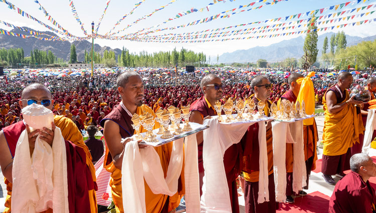 Monks holding traditional offerings for His Holiness the Dalai Lama during the Long Life Prayers at the Kalachakra Teaching Ground in Leh, Ladakh, India on August 17, 2025. Photo by Tenzin Choejor