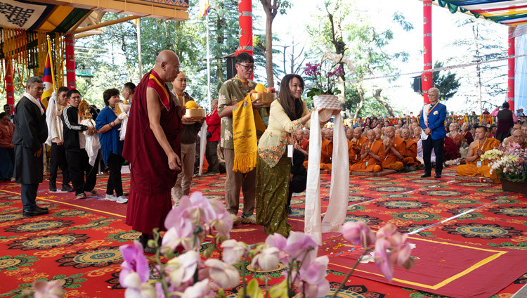 Devotees from Southeast Asian countries and Korea holding offerings for His Holiness the Dalai Lama during the Long Life Prayers and Cultural Performances at the Main Tibetan Temple courtyard in Dharamsala, HP, India on September 20, 2025. Photo by Tenzin Choejor