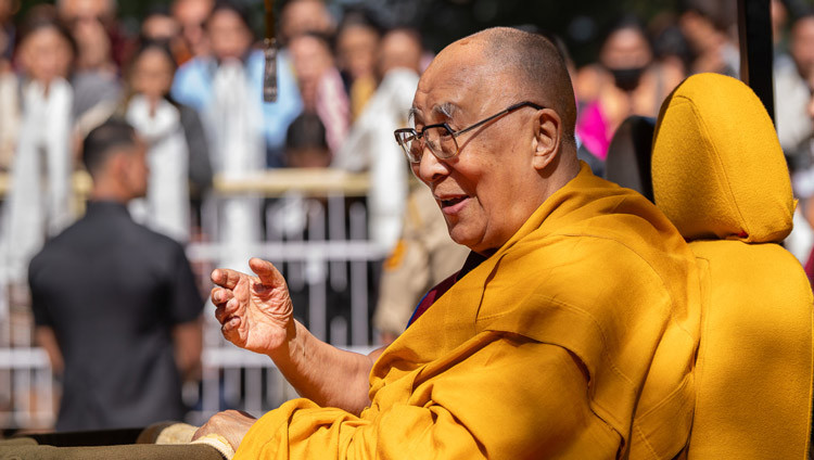 His Holiness the Dalai Lama riding a golf cart back to his residence at the conclusion of his teaching at the Main Tibetan Temple in Dharamsala, HP, India on October 4, 2025. Photo by Tenzin Choejor