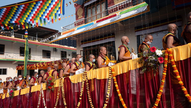 A procession of monks, nuns and patrons bearing offerings lined up outside the Drepung Lachi Assembly Hall during the Long Life Prayers for His Holiness the Dalai Lama in Mundgod, Karnataka, India on December 24, 2025. Photo by Tenzin Choejor