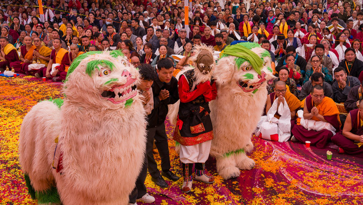 Snow Lion dancers watching as His Holiness the Dalai Lama arrives at Gaden Lachi to attend Long Life Prayers in Mundgod, Karnataka, India on January 21, 2026. Photo by Tenzin Choejor