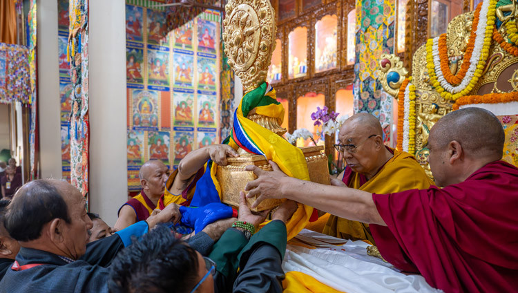 Representatives of the Döguling Tibetan Settlement offering a Wheel of Dharma to His Holiness the Dalai Lama during the Long Life Prayers at Gaden Lachi in Mundgod, Karnataka, India on January 21, 2026. Photo by Tenzin Choejor