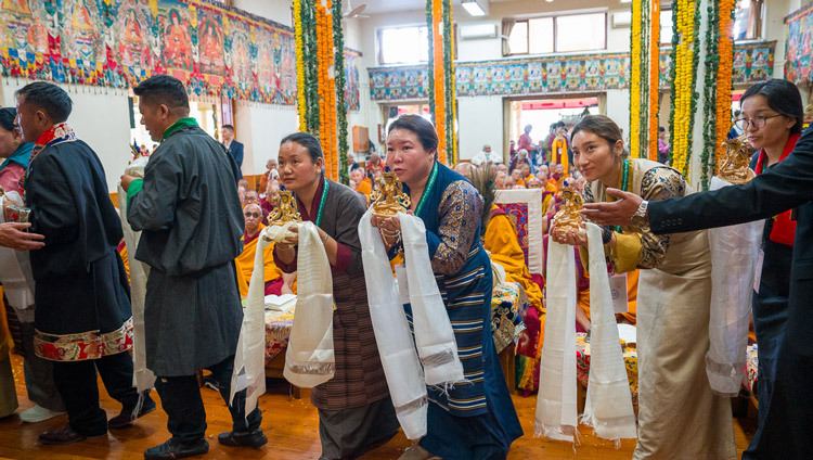 Members of the organizers parading in front of His Holiness the Dalai Lama holding offerings during the Long Life Prayers at the Main Tibetan Temple in Dharamsala, HP, India on April 22, 2026. Photo by Tenzin Choejor