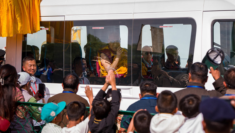 His Holiness the Dalai Lama driving in a mini-bus from his residence to the teaching platform to attend celebrations in honor of his 91st birthday in Leh, Ladakh, India on July 6, 2026. Photo by Ven Zamling Norub