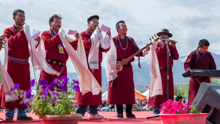 Dorjay Stakmo and his group singing a series of songs at celebrations in honor of His Holiness the Dalai Lama's 91st birthday at the Shewatsel Teaching Ground in Leh, Ladakh, India on July 6, 2026. Photo by Tenzin Choejor