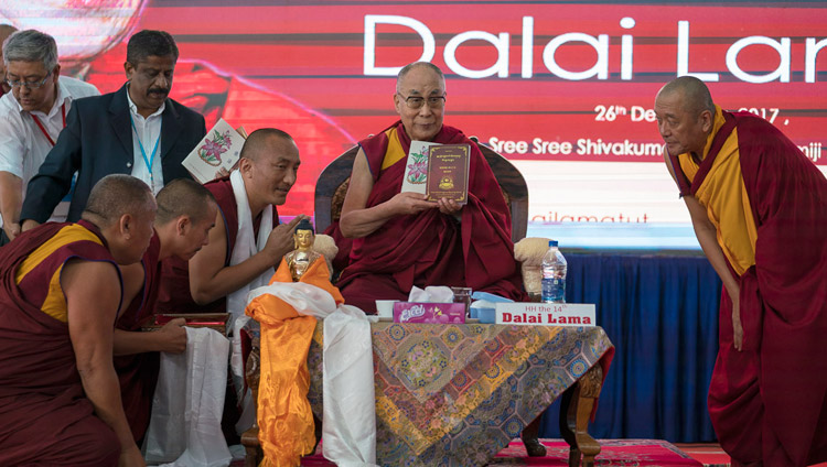 His Holiness the Dalai Lama releasing books produced and published by Sera Jey Monastery before his talk at Tumkur University in Tumakuru, Karnataka, India on December 26, 2017. Photo by Tenzin Choejor His Holiness the Dalai Lama releasing books produced and published by Sera Jey Monastery before his talk at Tumkur University in Tumakuru, Karnataka, India on December 26, 2017. Photo by Tenzin Choejor