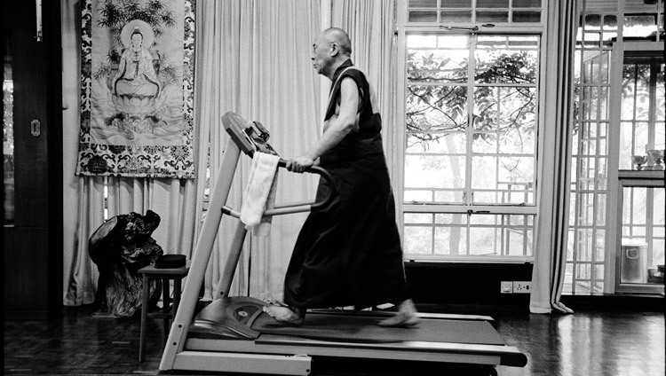 His Holiness the Dalai Lama exercising on his treadmill in his residence in Dharamsala, HP, India on 15 August, 2004. (Photo courtesy of Manuel Bauer) His Holiness the Dalai Lama exercising on his treadmill in his residence in Dharamsala, HP, India on 15 August, 2004. (Photo courtesy of Manuel Bauer)