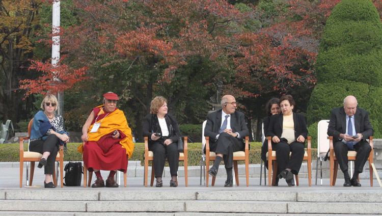 His Holiness the Dalai Lama and fellow Nobel Laureates at the Hiroshima Memorial Park on the third day of the 11th World Summit of Nobel Peace Laureates in Hiroshima, Japan on November 14th, 2010. (Photo by Taikan Usui) His Holiness the Dalai Lama and fellow Nobel Laureates at the Hiroshima Memorial Park on the third day of the 11th World Summit of Nobel Peace Laureates in Hiroshima, Japan on November 14th, 2010. (Photo by Taikan Usui)