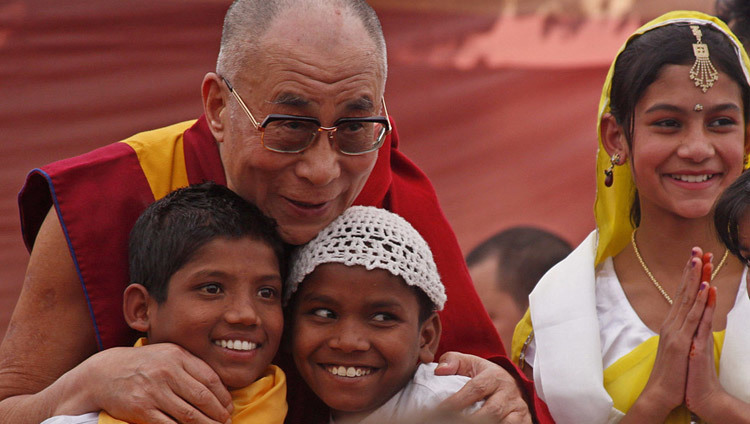 His Holiness the Dalai Lama with young children during the inauguration of the Tong Len hostile in Dharamsala, HP, India on November 19, 2011. (Photo by Tenzin Choejor/OHHDL) His Holiness the Dalai Lama with young children during the inauguration of the Tong Len hostile in Dharamsala, HP, India on November 19, 2011. (Photo by Tenzin Choejor/OHHDL)