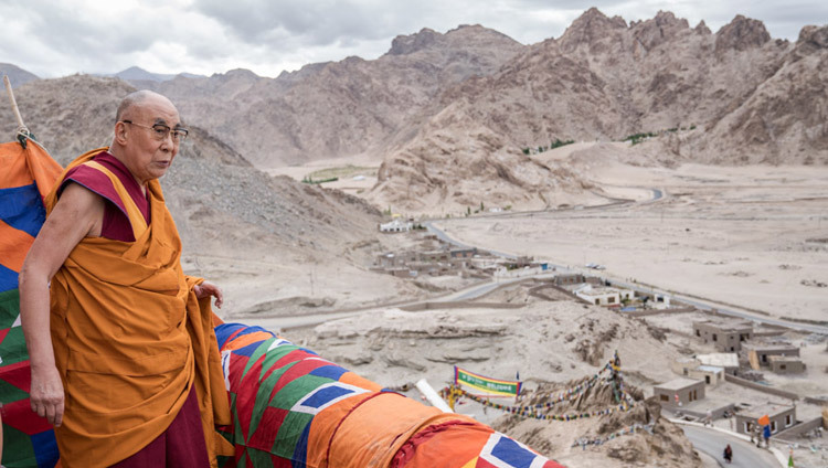 His Holiness the Dalai Lama looking out at the view of Leh Valley from Zangdok Palri Monastery in Ladakh, J&K, India on August 7, 2016. (Photo by Tenzin Choejor/OHHD His Holiness the Dalai Lama looking out at the view of Leh Valley from Zangdok Palri Monastery in Ladakh, J&K, India on August 7, 2016. (Photo by Tenzin Choejor/OHHD