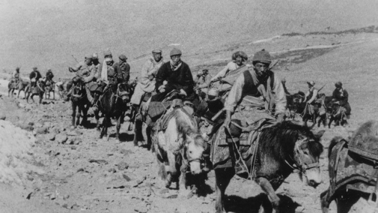 The 14th Dalai Lama fleeing Tibet into exile with Khampa (men from the Eastern province of Kham) bodyguards in March, 1959. (Photo/OHHDL) The 14th Dalai Lama fleeing Tibet into exile with Khampa (men from the Eastern province of Kham) bodyguards in March, 1959. (Photo/OHHDL)