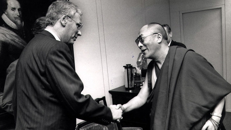 His Holiness the Dalai Lama greeting Minister of Foreign Affairs of The Netherlands Hans van den Broek in Amsterdam, the Netherlands on September 10, 1990. His Holiness the Dalai Lama greeting Minister of Foreign Affairs of The Netherlands Hans van den Broek in Amsterdam, the Netherlands on September 10, 1990.