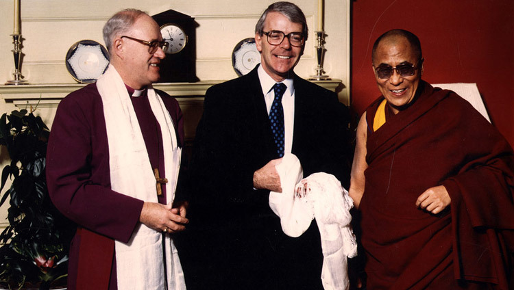Archbishop of Canterbury John Leonard Carey and UK Prime Minister John Major with His Holiness the Dalai Lama in London, UK on December 2, 1991. Archbishop of Canterbury John Leonard Carey and UK Prime Minister John Major with His Holiness the Dalai Lama in London, UK on December 2, 1991.