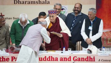 In the Path of the Buddha and Gandhi